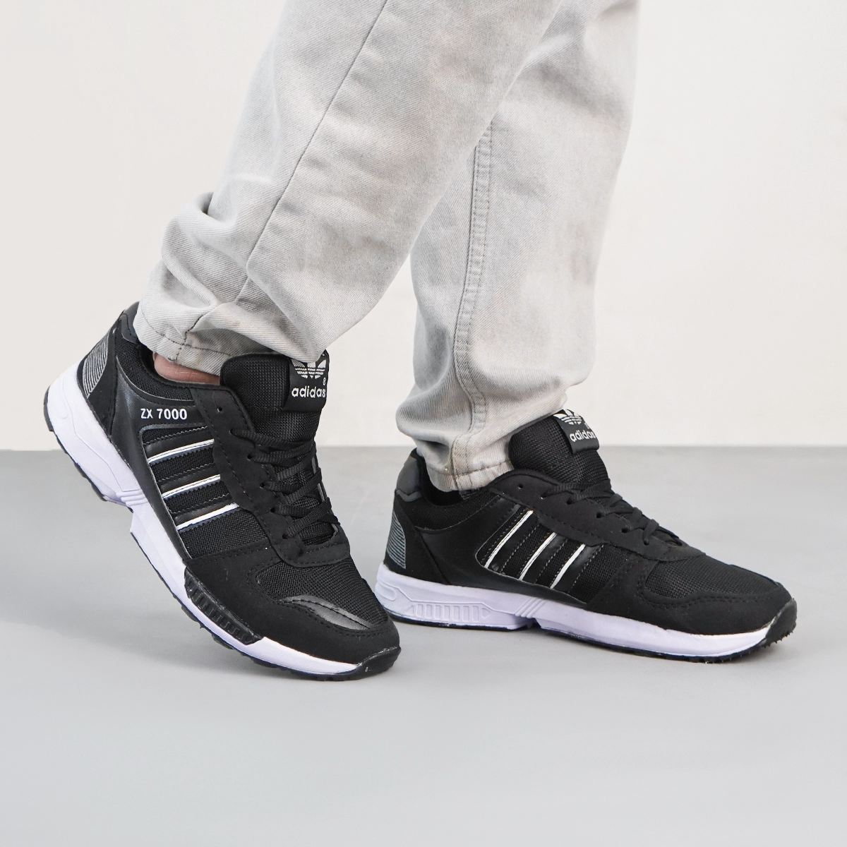 کفش ورزشی مردانه مشکی سفید مدل ZX7000